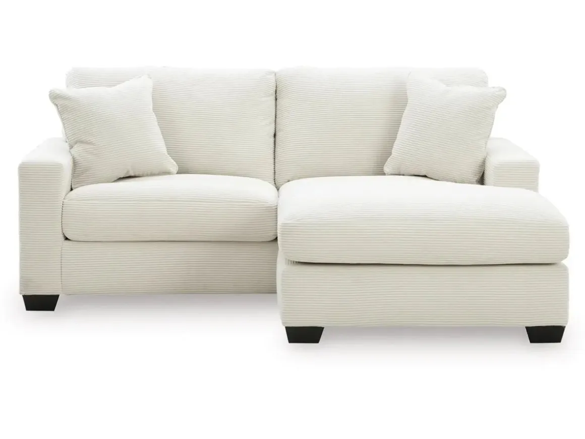 Amesley Sofa Chaise In Ivory